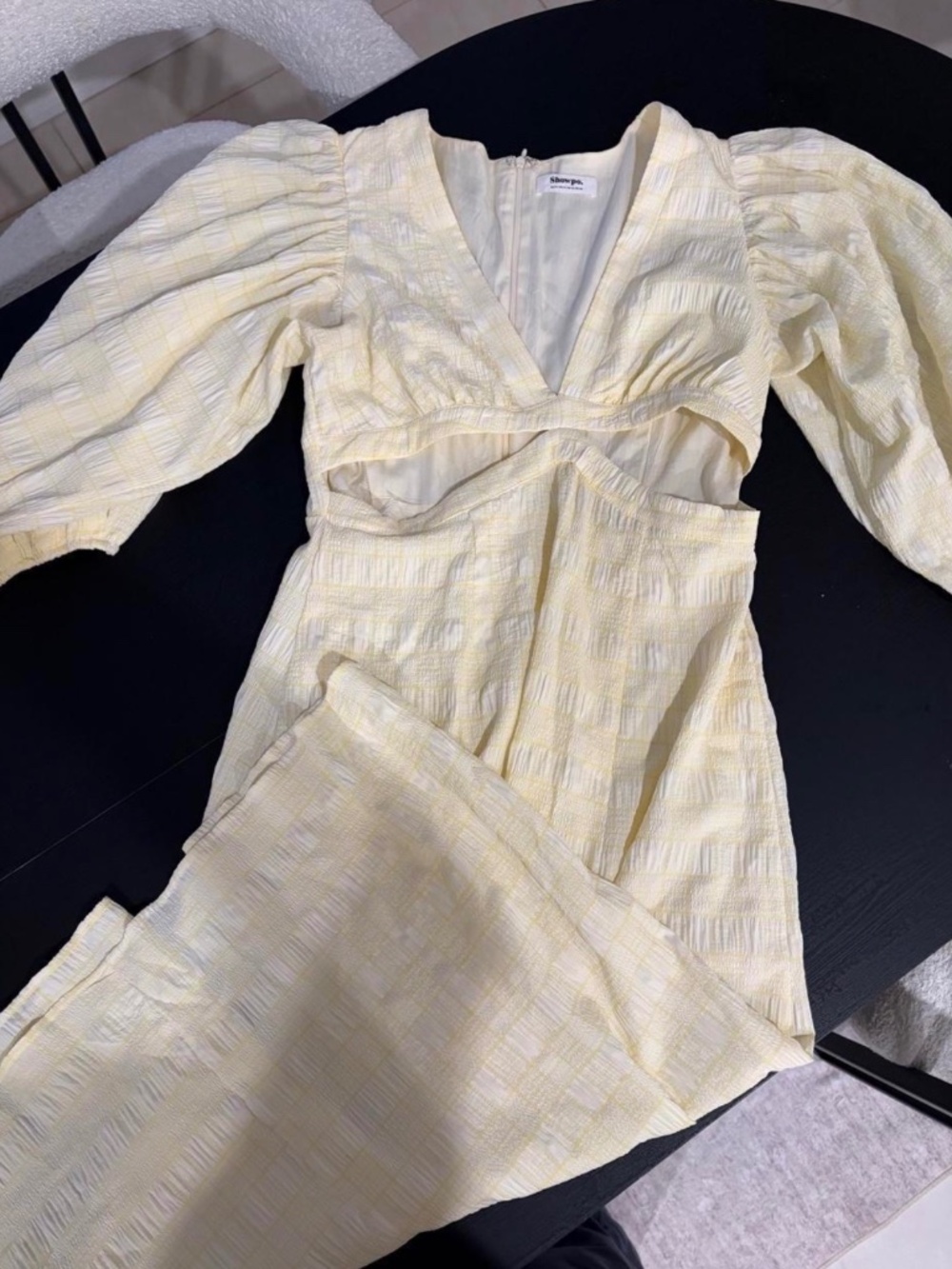 Woman’s yellow showpo dress